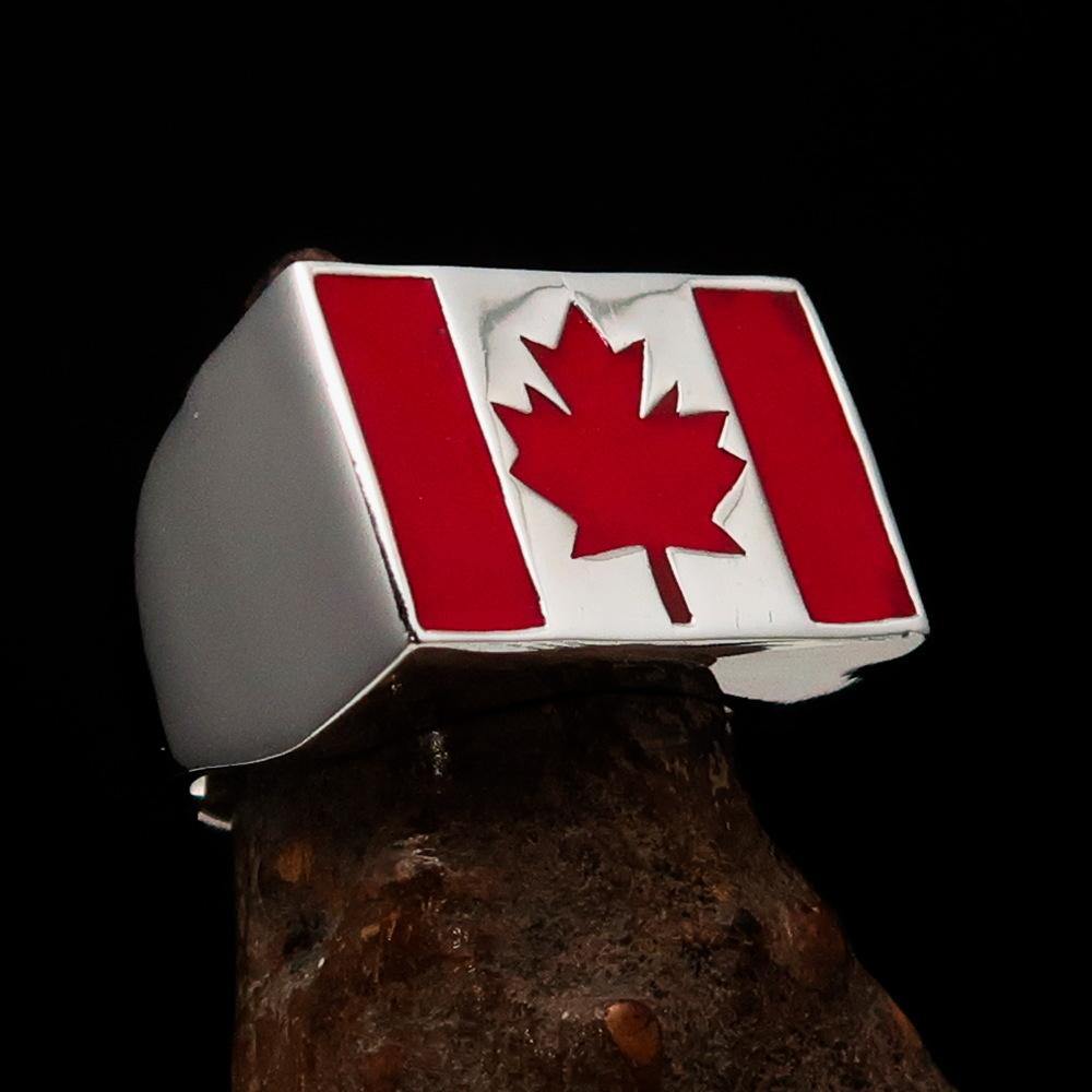 Men's ring featuring the Flag of Canada, crafted from solid sterling silver with high polish and red enamel accents.