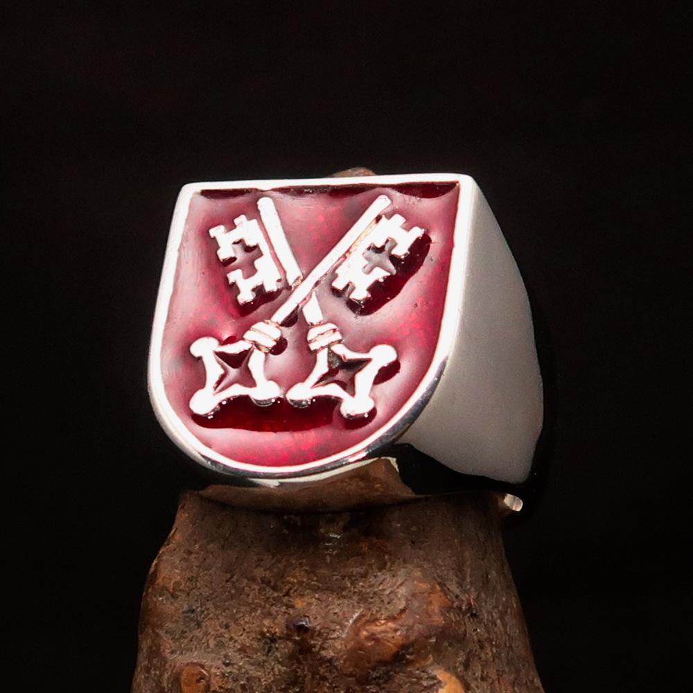 Men's Shield Ring with crossed red skeleton keys, crafted from solid sterling silver with a high polish finish and red enamel detailing.