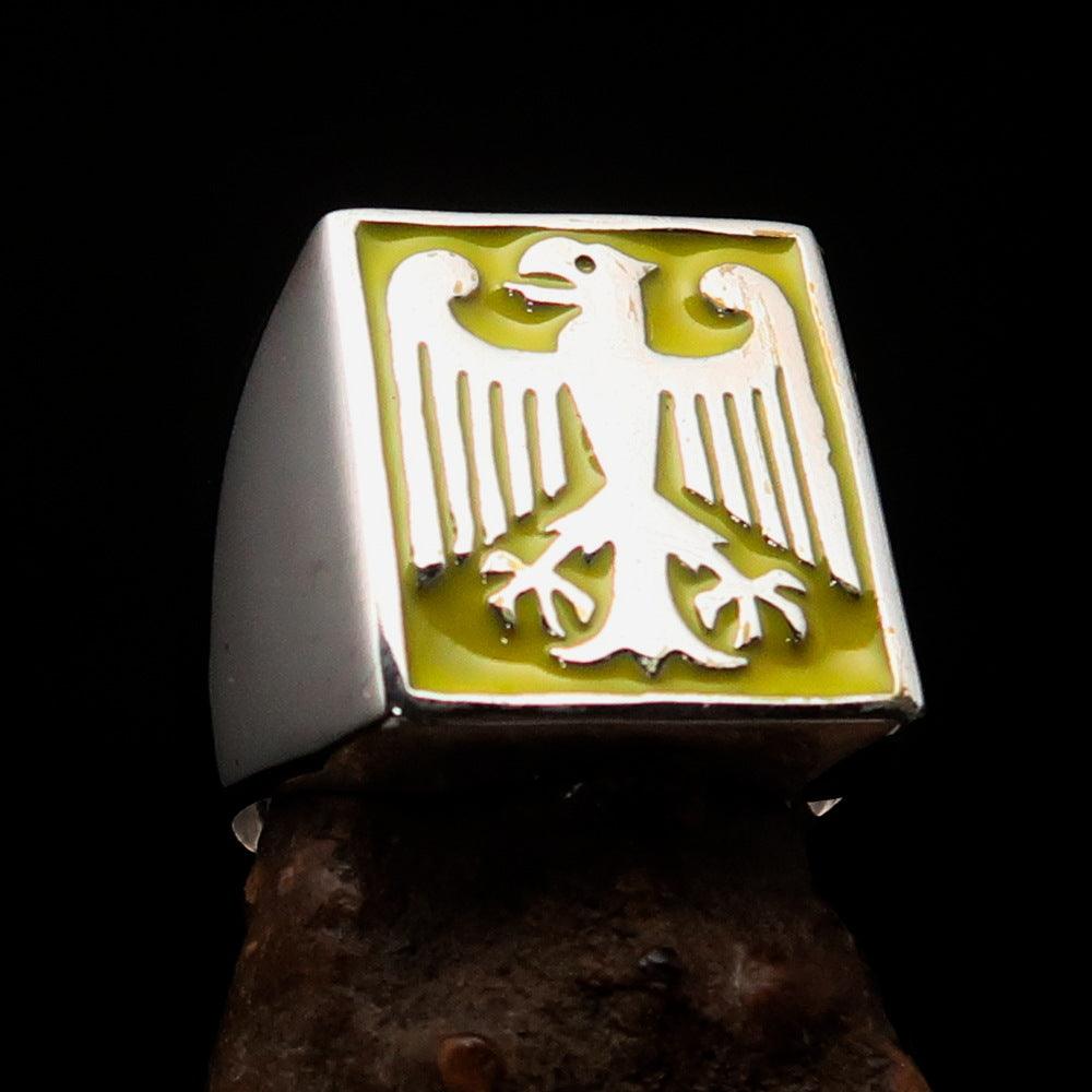 Men's yellow German Eagle Seal Ring made of sterling silver with yellow enamel accents, showcasing a high polish finish.