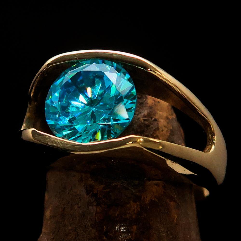 Men's Brass Solitaire Ring featuring a blue Cubic Zirconia stone, elegantly polished and crafted for a sophisticated look.