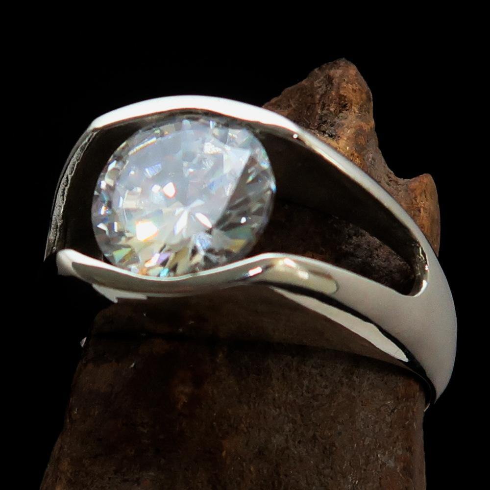 Smoothly crafted sterling silver men's solitaire ring featuring a round white cubic zirconia stone, polished to a high shine.