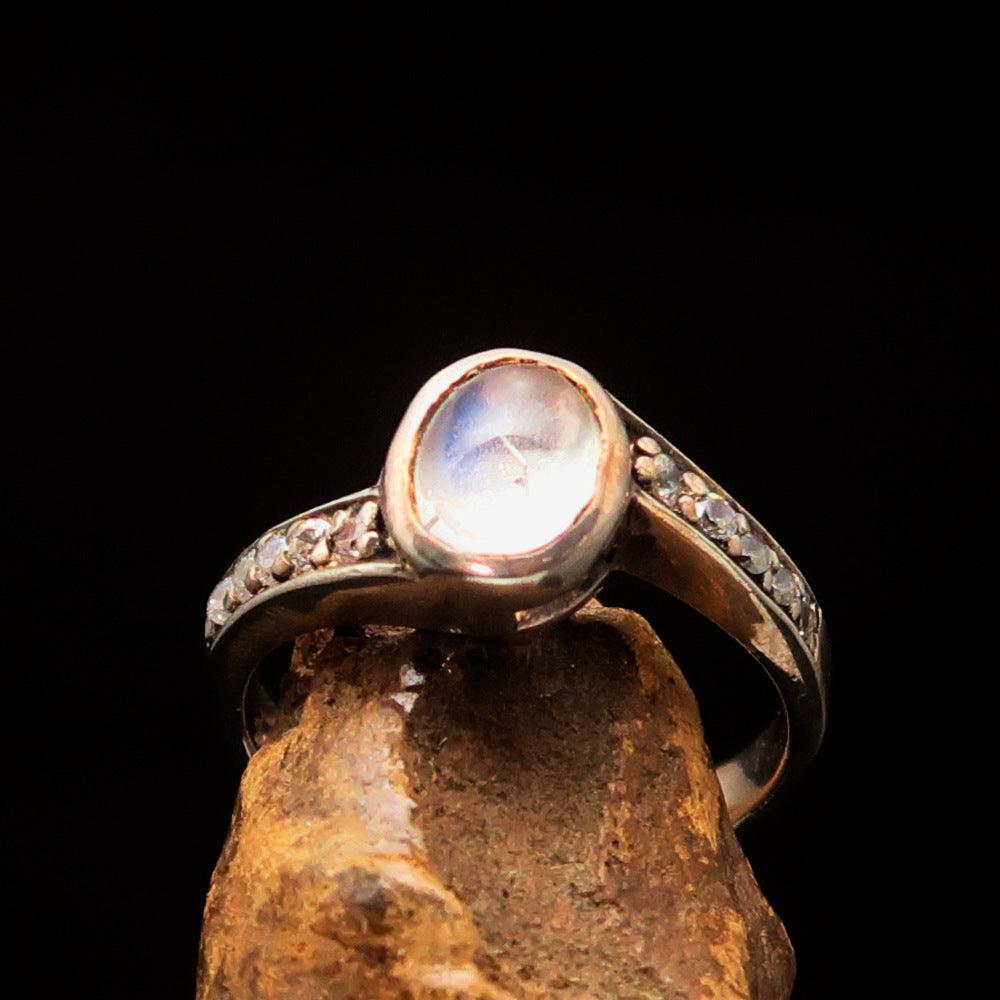 Sterling Silver Solitaire Ring featuring an oval Ceylon Moonstone, polished finish, and hallmark 925.