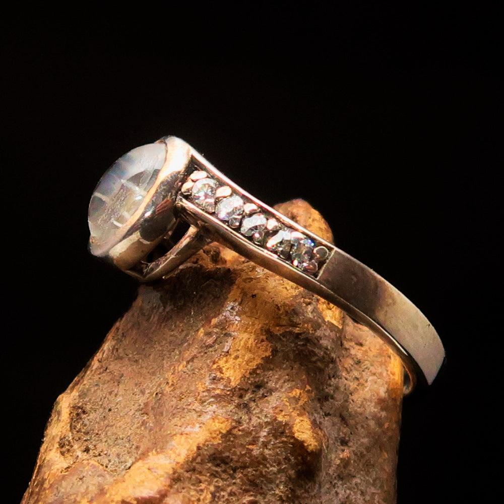 Sterling Silver Solitaire Ring featuring an oval Ceylon Moonstone, polished finish, and hallmark 925.