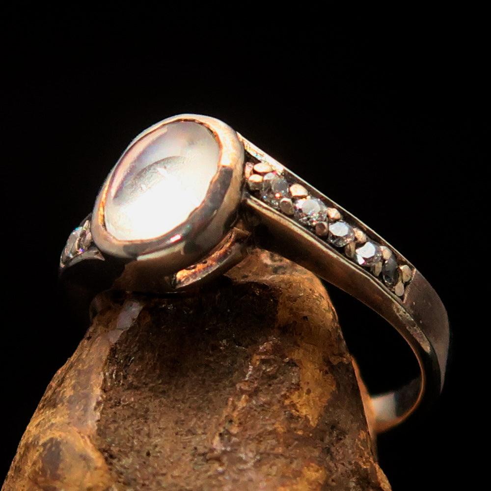 Sterling Silver Solitaire Ring featuring an oval Ceylon Moonstone, polished finish, and hallmark 925.