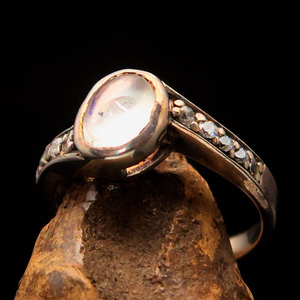 Sterling Silver Solitaire Ring featuring an oval Ceylon Moonstone, polished finish, and hallmark 925.