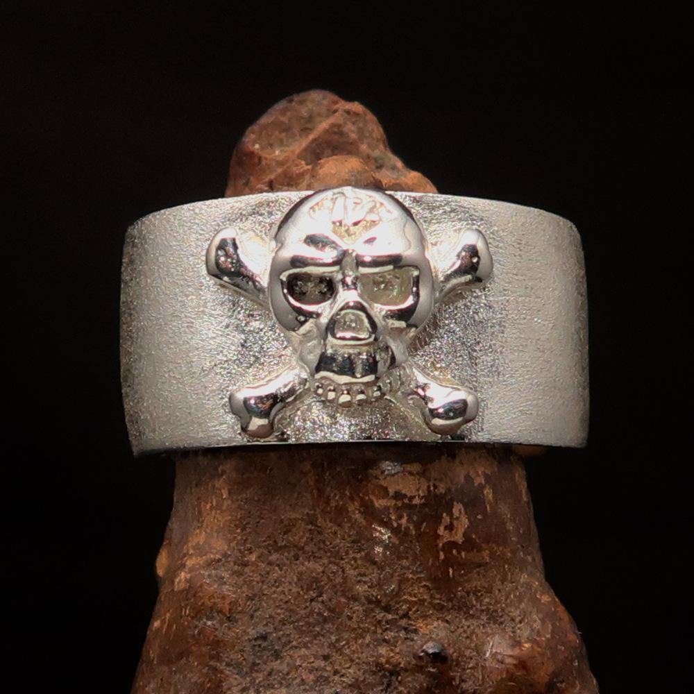 Two Tone Men's Outlaw 1% Jolly Roger Skull Band Ring in matte sterling silver, showcasing a unique skull design with a polished finish.