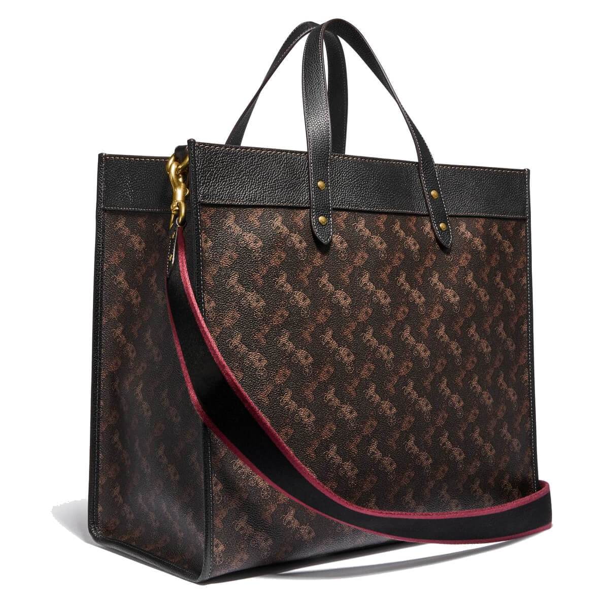 Coach Ladies Field Tote 40 in Truffle Black with Horse and Carriage print, showcasing polished pebble leather and coated canvas.
