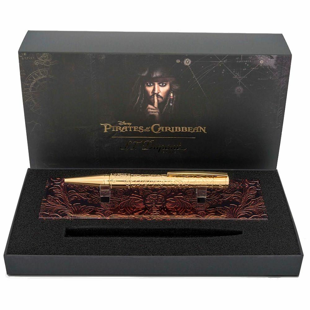 S.T. Dupont Pirates of the Caribbean Gold Tone Ballpoint Pen featuring a baroque design and iconic skull detail.