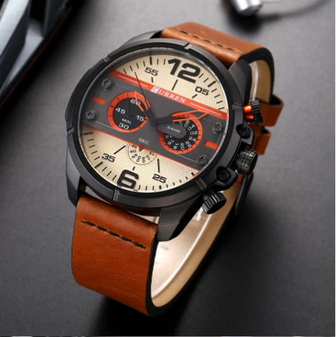 Valorous Curren Leather Watch featuring a tangerine leather band and silver polished bezel, showcasing its elegant design and three crowns.