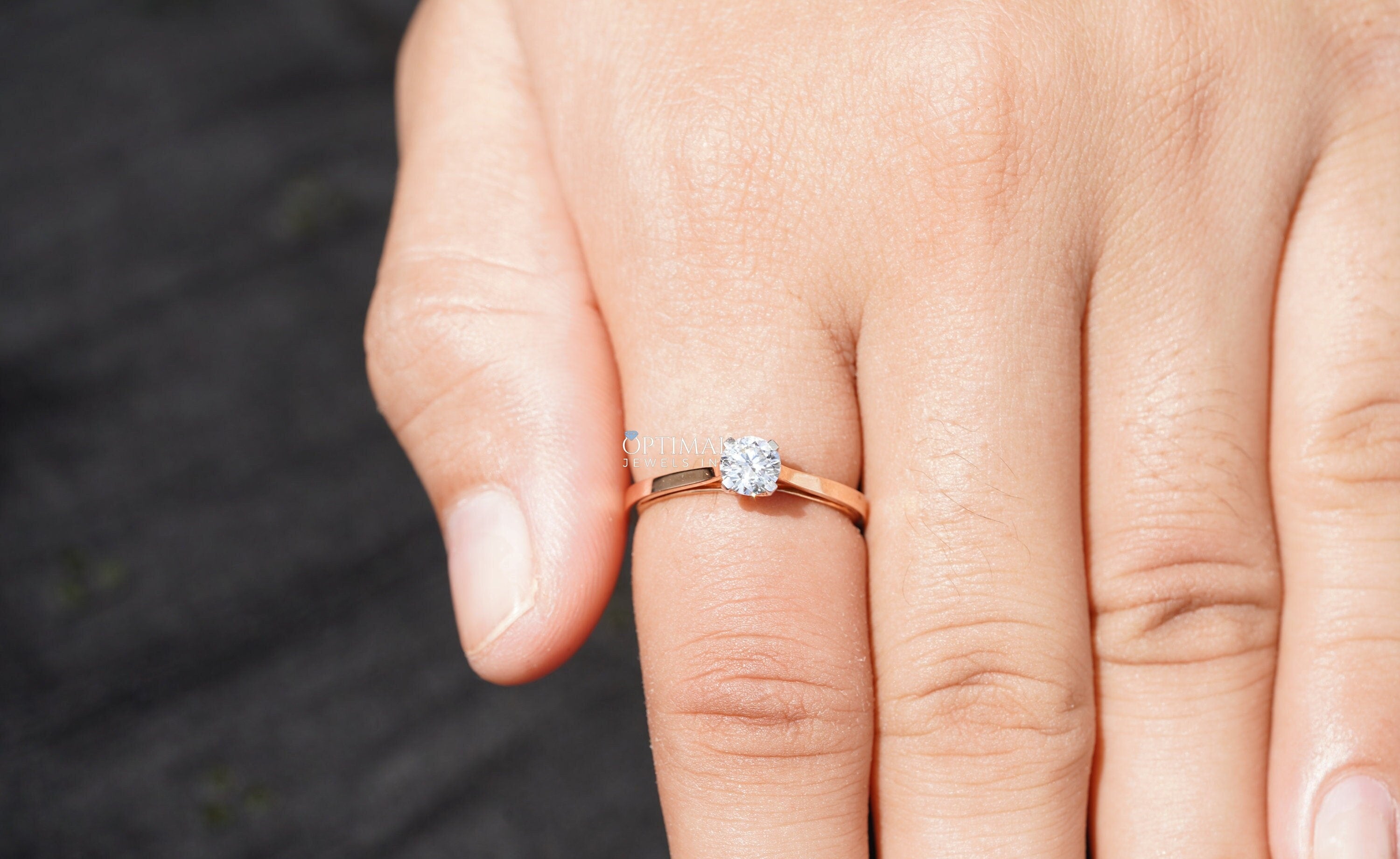 0.45 CT Round Cut Lab Grown Diamond Ring in Rose Gold, showcasing a sparkling solitaire design perfect for engagement or gifting.