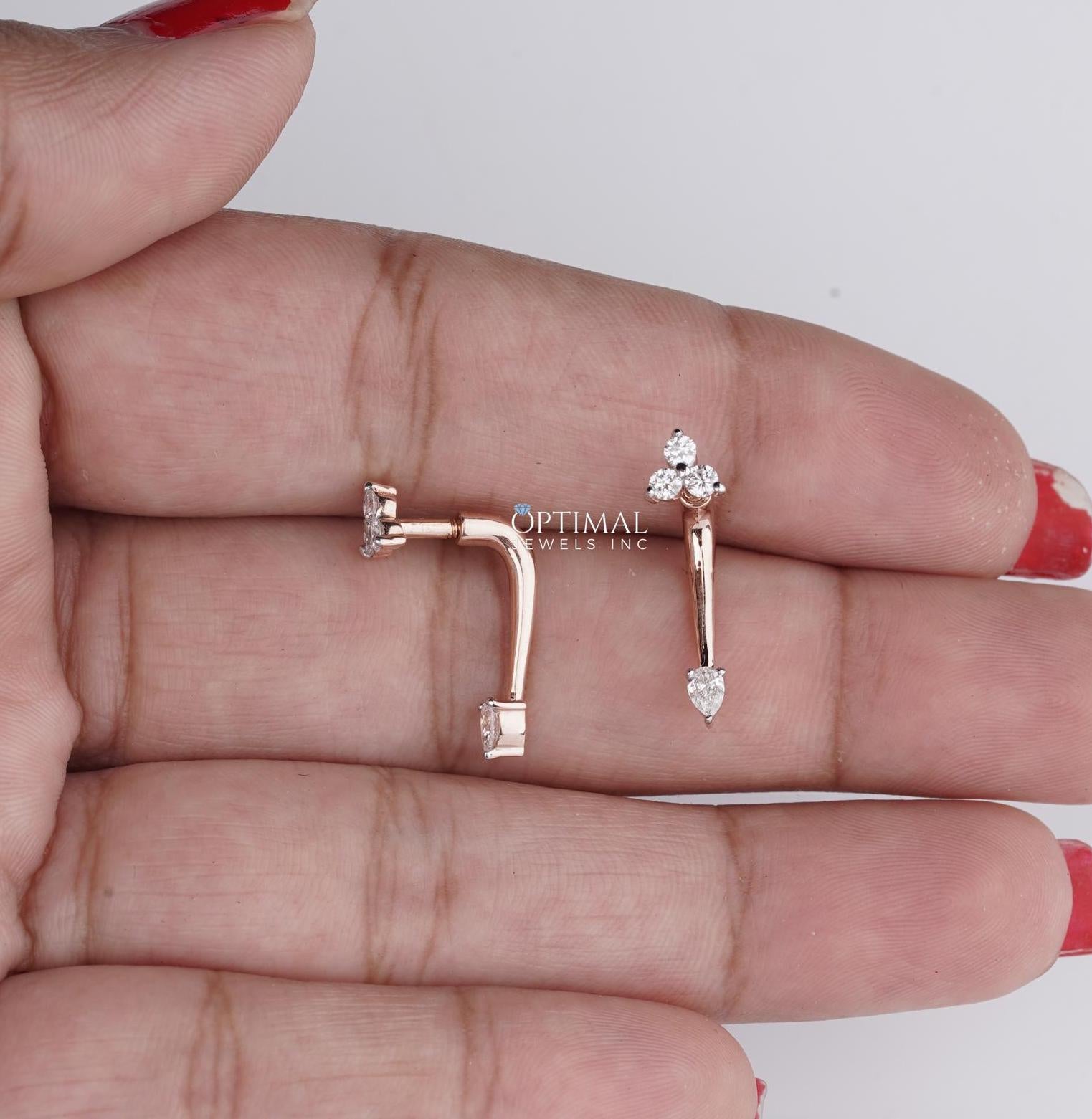 0.50 CTW Unique Rose Gold Earring featuring lab-grown diamonds in asymmetric design with round and pear-cut stones.