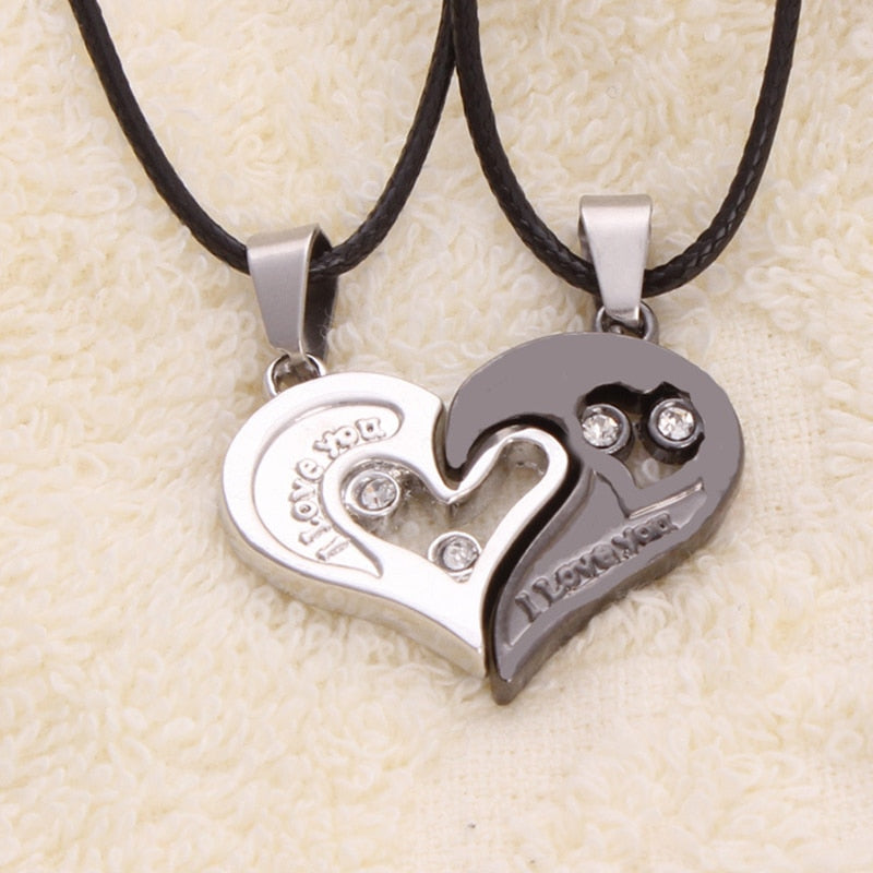 Fashion Couple Heart Shape I Love You Pendant Necklace displayed with a leather chain, showcasing its stylish design and heart shape.
