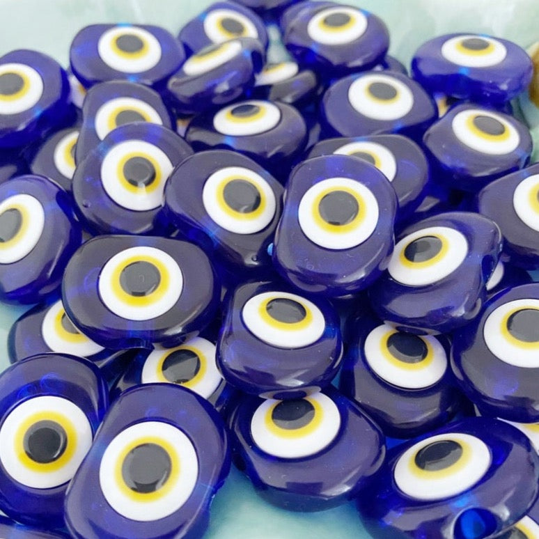 A collection of 10 blue resin evil eye charms, each 30mm in size, featuring a 6mm hole, perfect for wedding favors and party gifts.