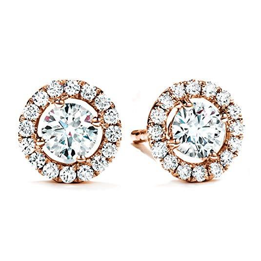 A luxurious 5-piece jewelry set featuring a tennis bracelet, halo earrings, and a necklace, all adorned with sparkling Austrian crystals and rose gold plating.