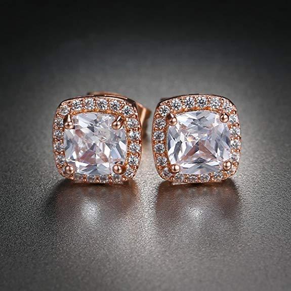 A luxurious 5-piece jewelry set featuring a tennis bracelet, halo earrings, and a necklace, all adorned with sparkling Austrian crystals and rose gold plating.