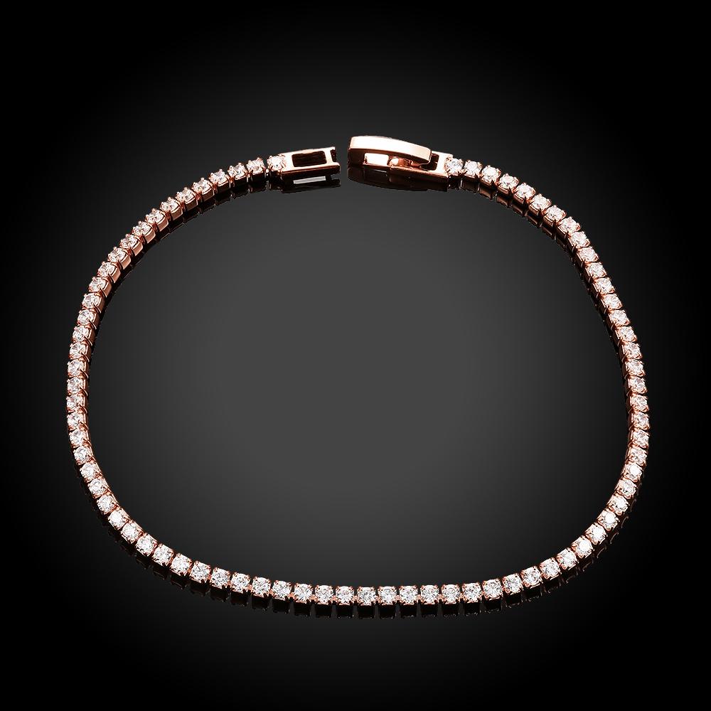 A luxurious 5-piece jewelry set featuring a tennis bracelet, halo earrings, and a necklace, all adorned with sparkling Austrian crystals and rose gold plating.