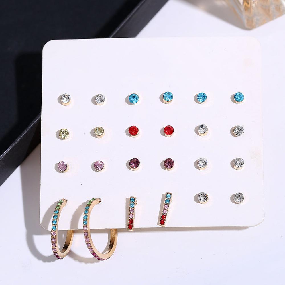 A beautiful 12 piece rainbow earring set featuring 18K white gold plating and vibrant Austrian crystals, showcasing a variety of colorful designs.