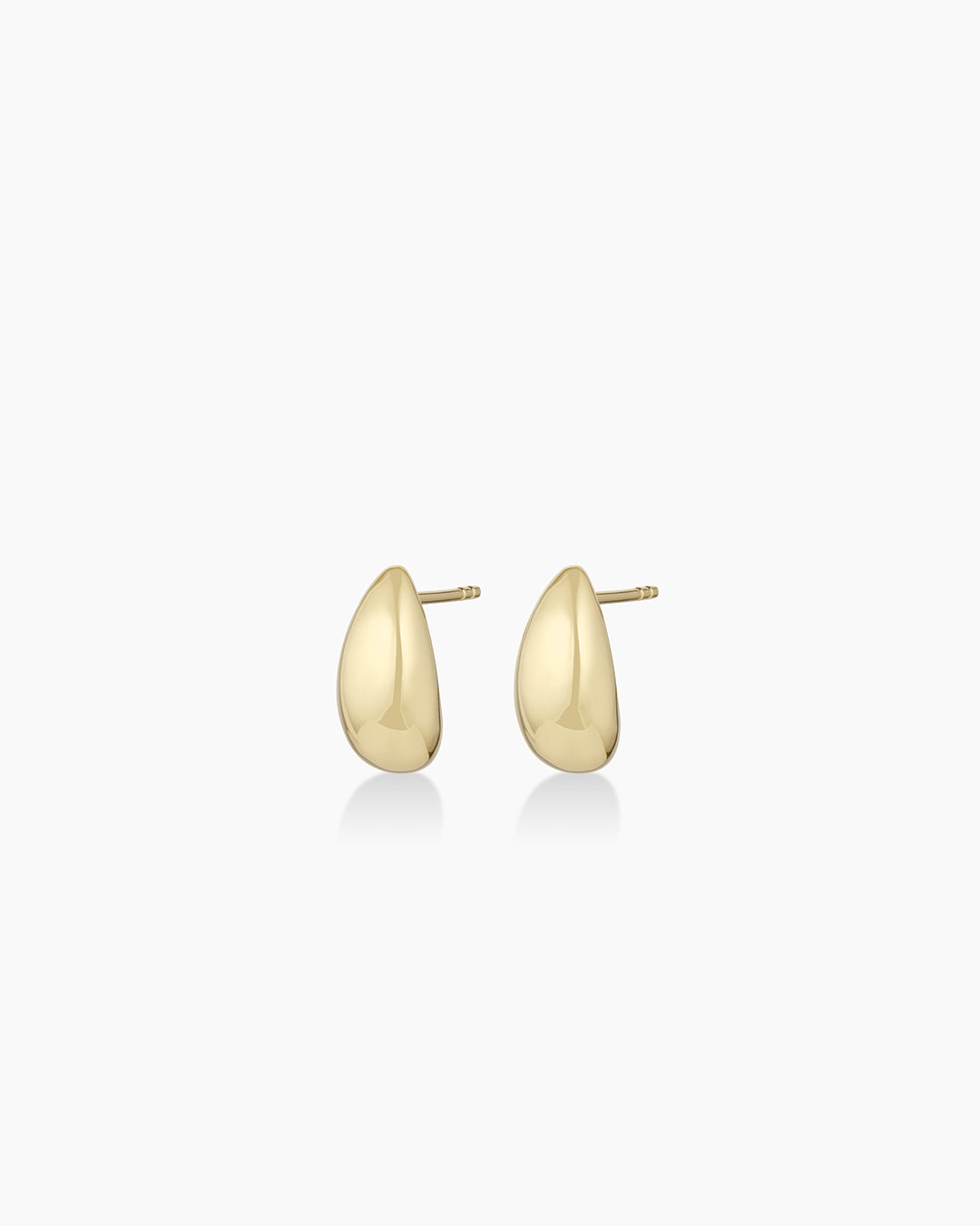 A pair of elegant 14k gold Banks Studs, showcasing their delicate yet bold design, perfect for any occasion.