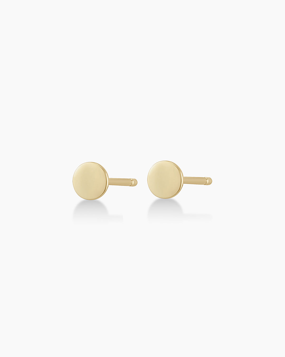 Elegant 14k gold coin stud earrings showcasing a classic design, perfect for everyday wear.