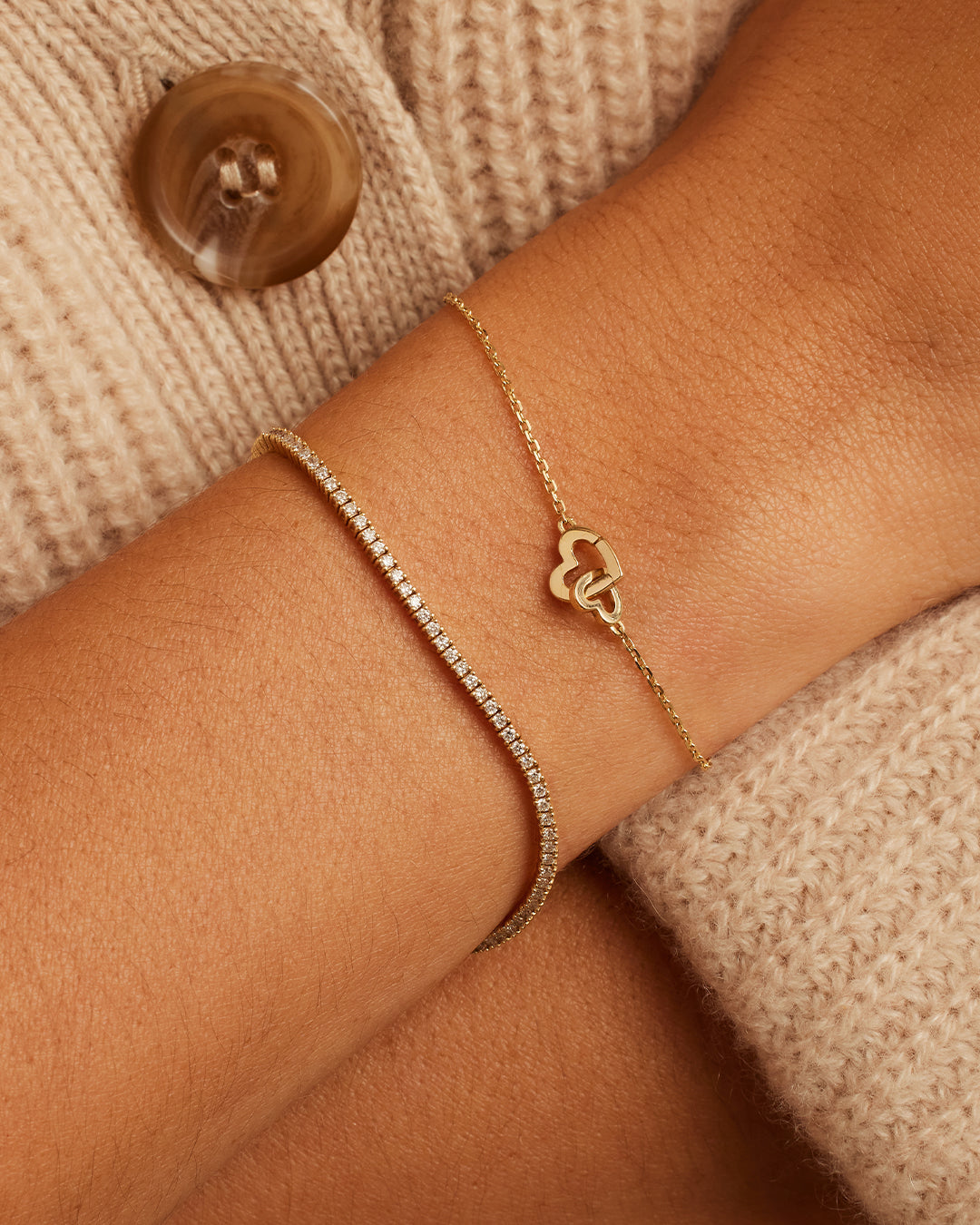14k Gold Parker Heart Bracelet featuring a stunning heart-shaped design, symbolizing love and bravery.