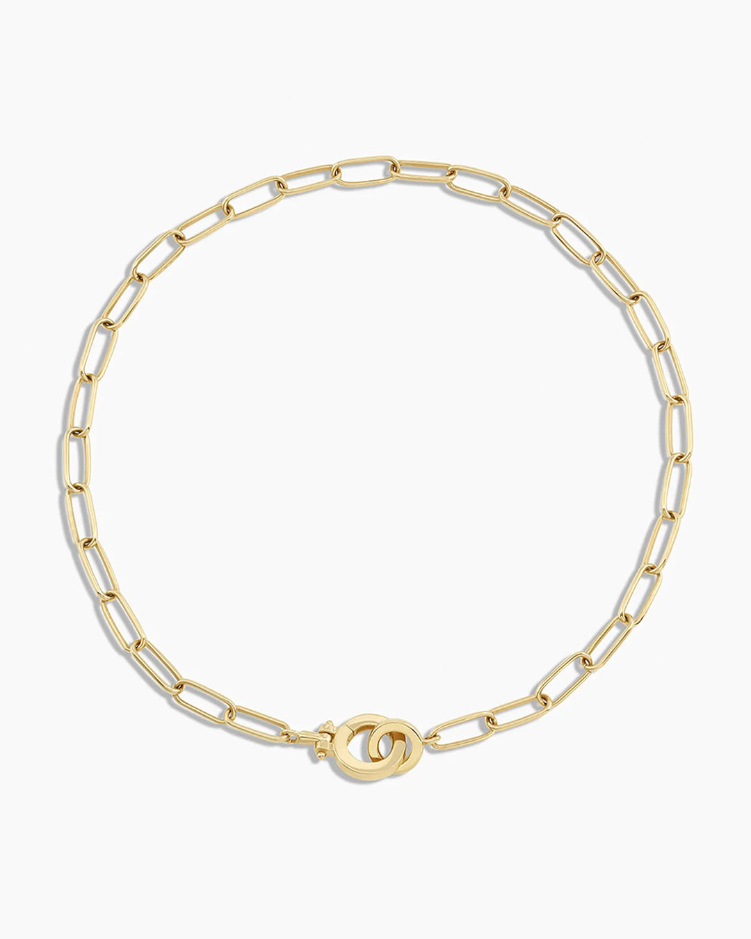 A luxurious 14k Gold Parker Mini Bracelet featuring a bold design with a 5 mm ring closure and 7 mm hinge clasp.