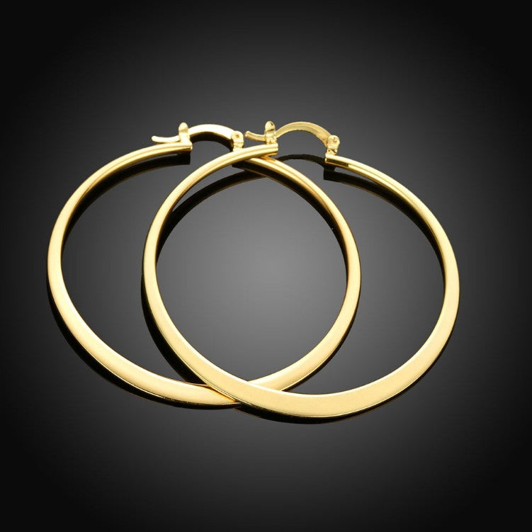 14K Gold Plated Sleek Classic Test Tube Hoop Earrings displayed elegantly, showcasing their unique design and shiny finish.