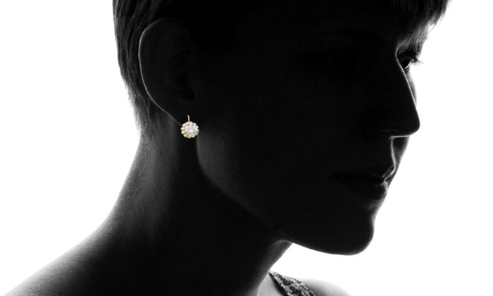 14K Gold Plating Large Floral White Sapphire Pav'e Huggies featuring a floral design with sparkling white sapphires, perfect for elegant occasions.