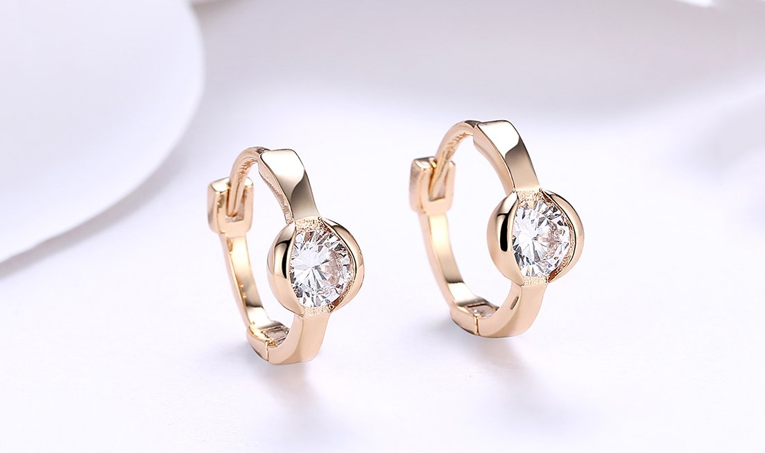 Elegant 14K gold plated circular clip-on earrings featuring white Austrian elements, designed in Italy for a luxurious look.