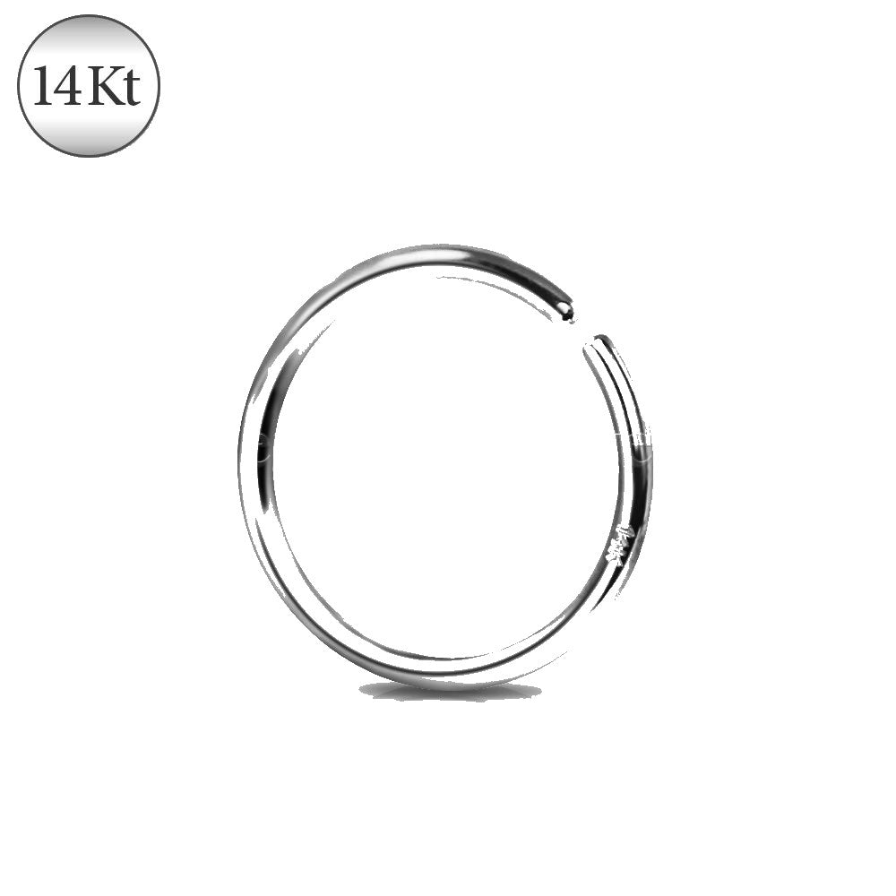 A 14Kt white gold seamless ring with a smooth round design, ideal for various piercings including nose and cartilage.