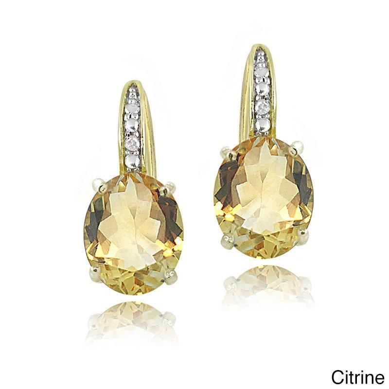 Elegant 1.50 Ct Oval Cut Yellow Stud Earrings with Pave Crystals in 18K Gold Plating, showcasing exquisite craftsmanship and design.