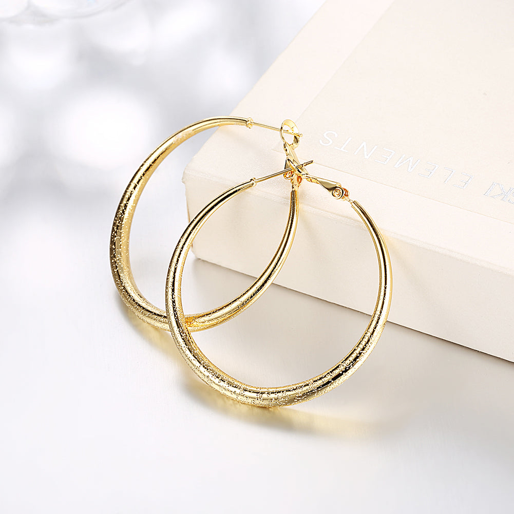 Elegant 1.6-inch round hoop earrings in 18K gold plating, showcasing a shiny finish and lightweight design, perfect for any occasion.