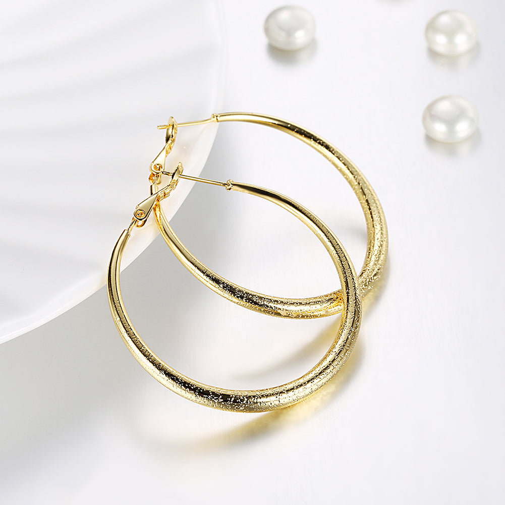 Elegant 1.6-inch round hoop earrings in 18K gold plating, showcasing a shiny finish and lightweight design, perfect for any occasion.