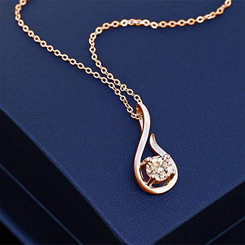 Elegant 1.60 CTTW Elements Dangling Harp Pendant Necklace in 14K Rose Gold with morganite stones, showcasing a unique design.