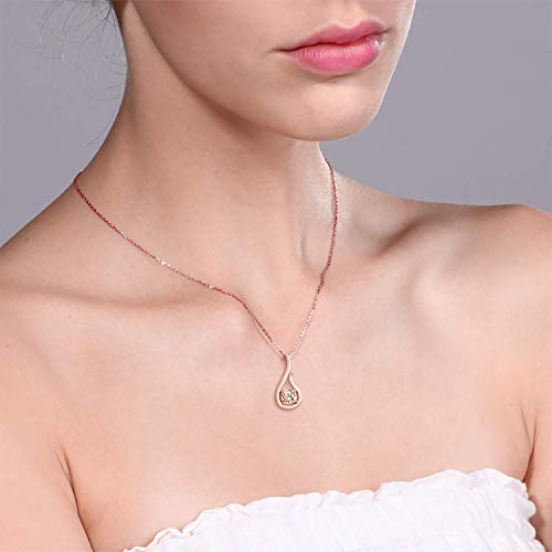 Elegant 1.60 CTTW Elements Dangling Harp Pendant Necklace in 14K Rose Gold with morganite stones, showcasing a unique design.