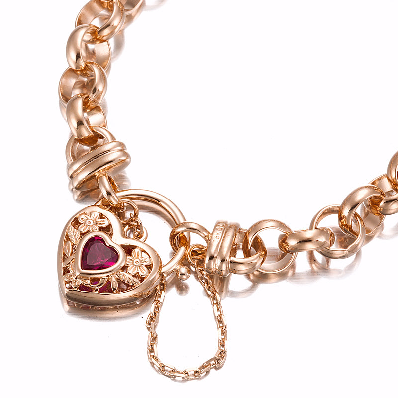 18ct Heavy Rose Gold Plated 10mm Belcher Chain Bracelet with filigree locket and simulated ruby, showcasing its elegant design.