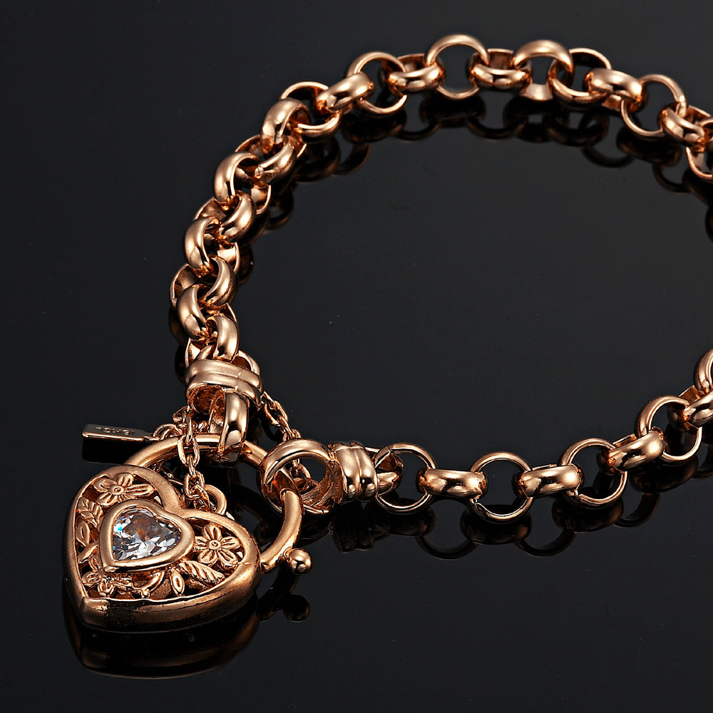 18ct Heavy Rose Gold Plated 6mm Belcher Chain Bracelet featuring a filigree locket, showcasing its elegant design and craftsmanship.