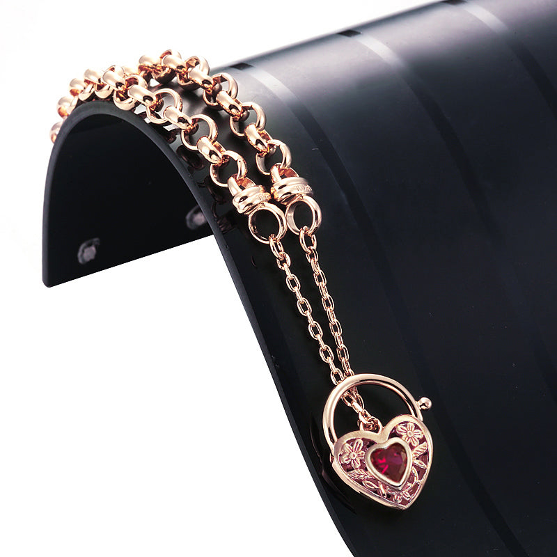 18ct Heavy Rose Gold Plated 6mm Belcher Chain Bracelet featuring a filigree locket, showcasing its elegant design and luxurious finish.