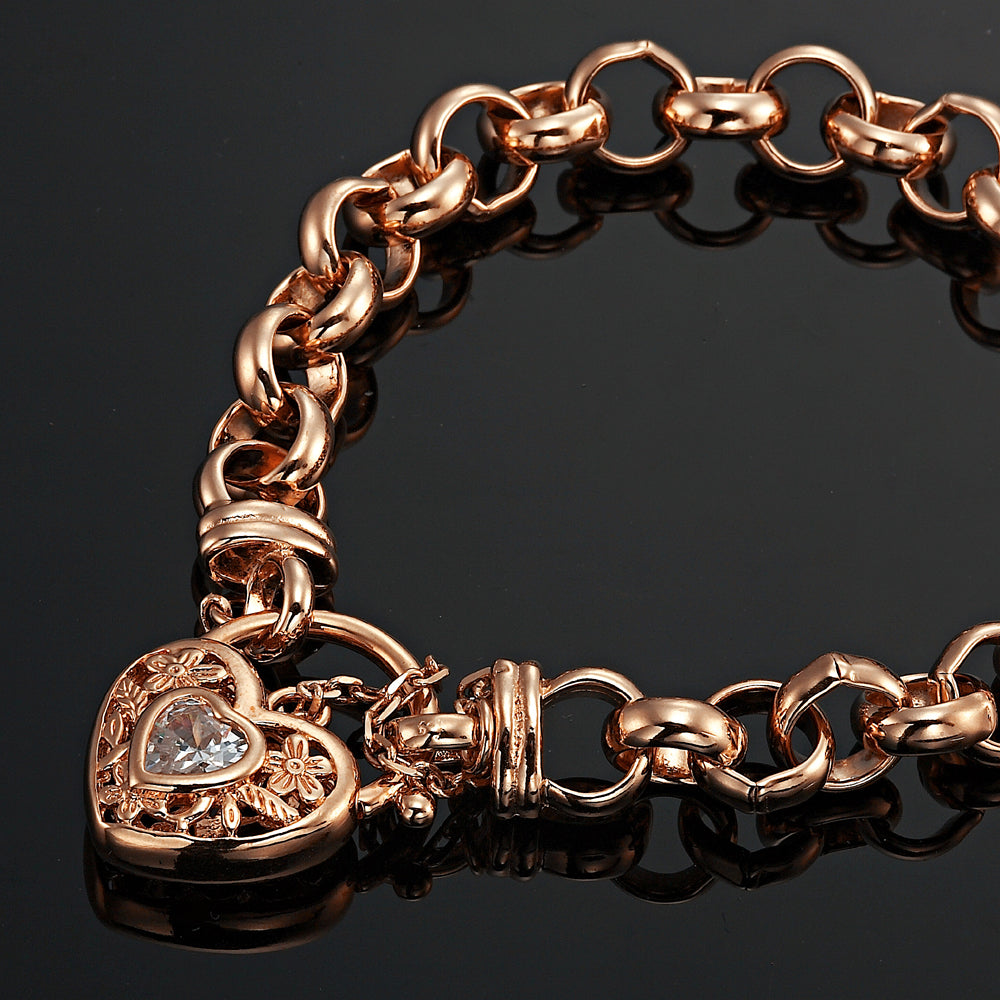 18ct Heavy Rose Gold Plated Belcher Chain Bracelet with a filigree locket and simulated diamond, showcasing its elegant design.