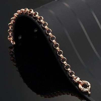 A luxurious 18ct heavy rose gold plated belcher chain bracelet with a secure bolt clasp, showcasing its elegant design and craftsmanship.