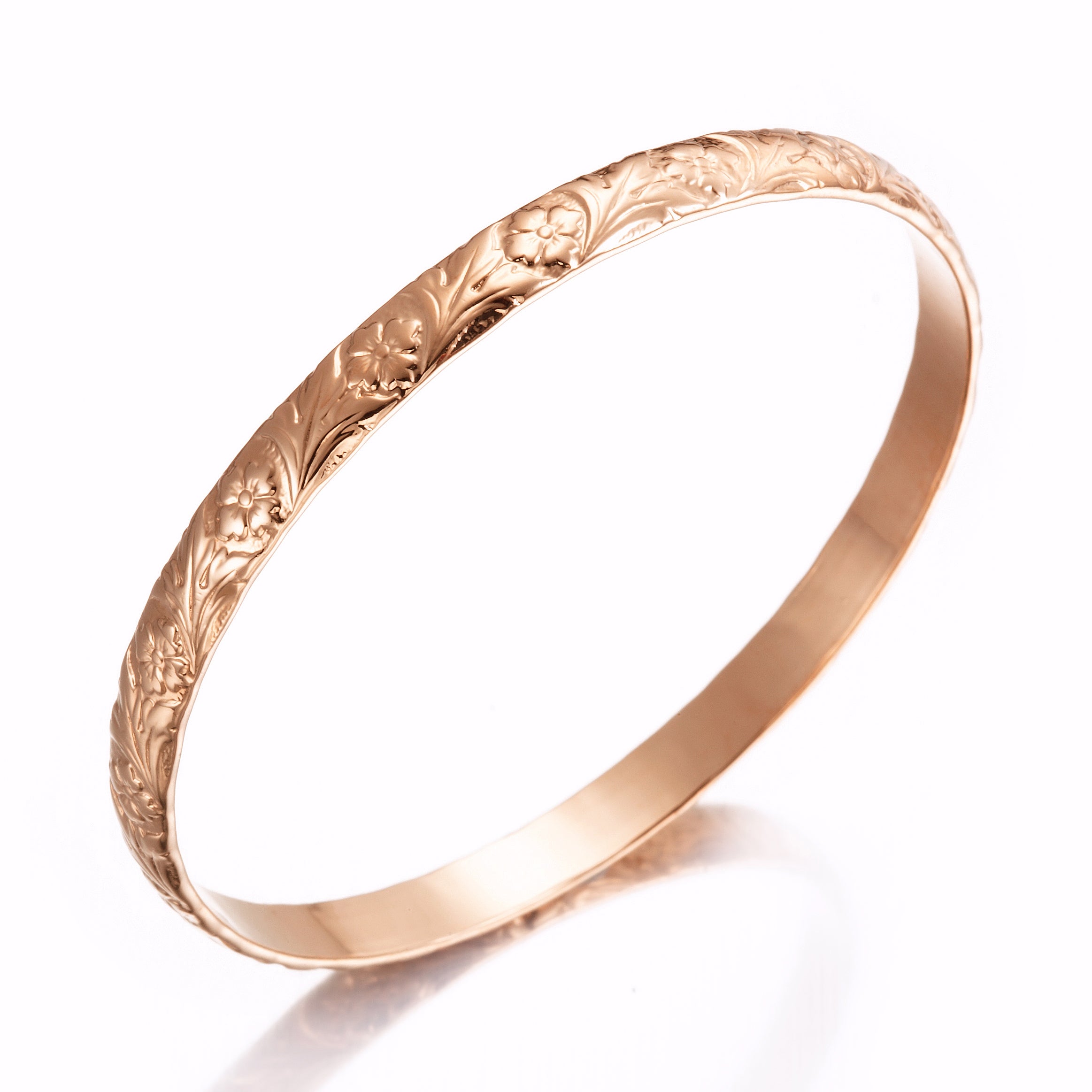 18ct Heavy Rose Gold Plated Embossed Filigree Women's Bangle showcasing intricate filigree design and luxurious rose gold finish.