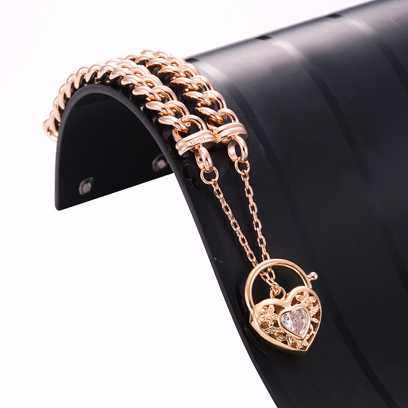 18ct Heavy Rose Gold Plated Euro Chain Bracelet featuring a filigree locket and simulated diamond, showcasing its elegant design.
