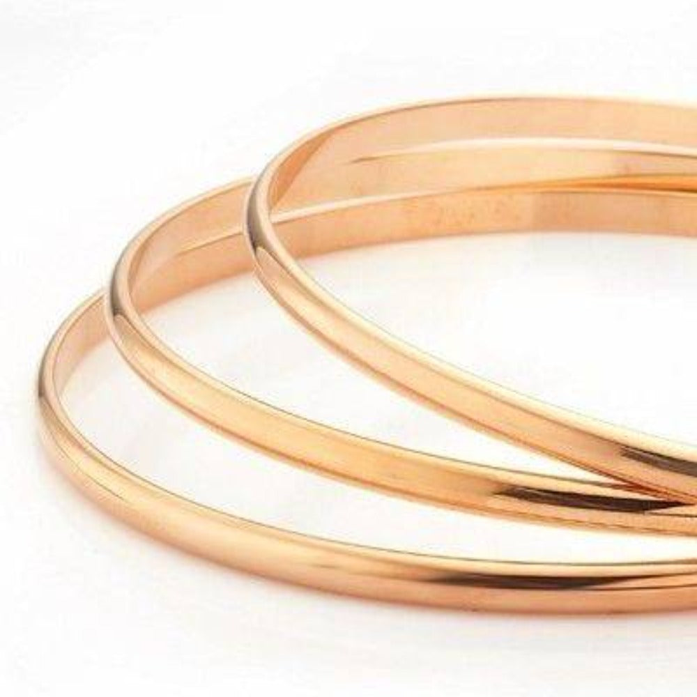 18ct Heavy Rose Gold Plated Plain 3mm Triple Bangle Set, showcasing three elegant bangles with a luxurious rose gold finish.