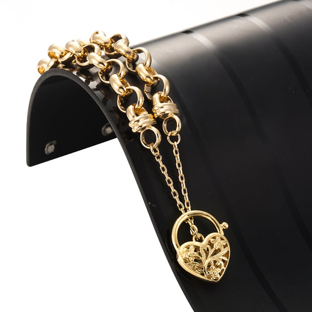 18ct Heavy Yellow Gold Plated 10mm Belcher Bracelet with filigree locket, showcasing its elegant design and luxurious gold finish.