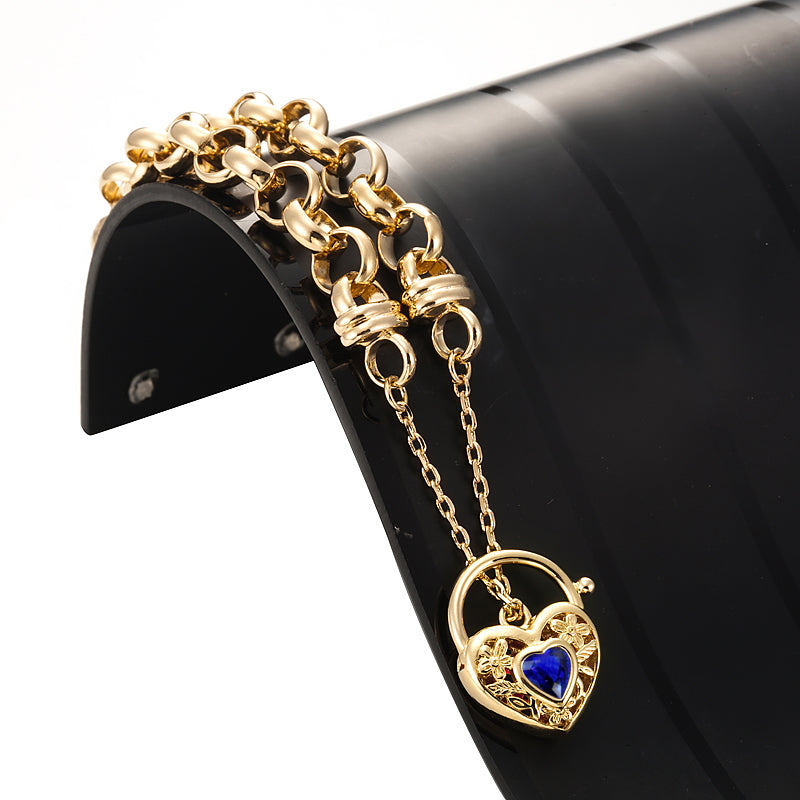 18ct Heavy Yellow Gold Plated 10mm Belcher Chain Bracelet featuring a Dark Blue Filigree Locket, showcasing its elegant design and quality craftsmanship.