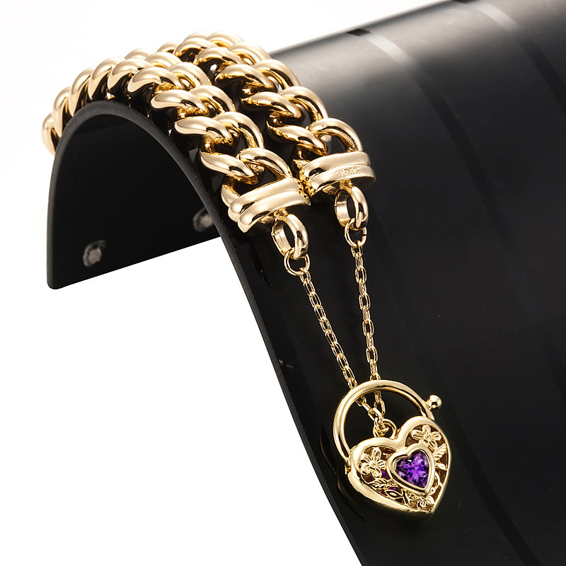 18ct Heavy Yellow Gold Plated 12mm Euro Curb Chain Bracelet with a purple filigree locket, showcasing its elegant design and craftsmanship.