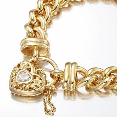 18ct Heavy Yellow Gold Plated 12mm Euro Curb Chain Bracelet with filigree locket and simulated diamond, showcasing its luxurious design.