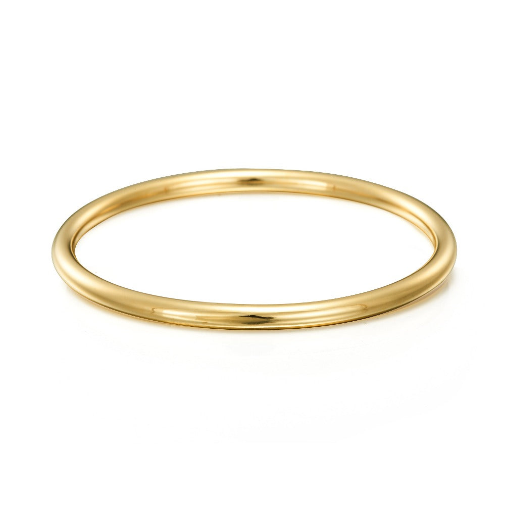 A beautiful 18ct heavy yellow gold plated children's golf bangle, showcasing its shiny finish and elegant design, available in two sizes.