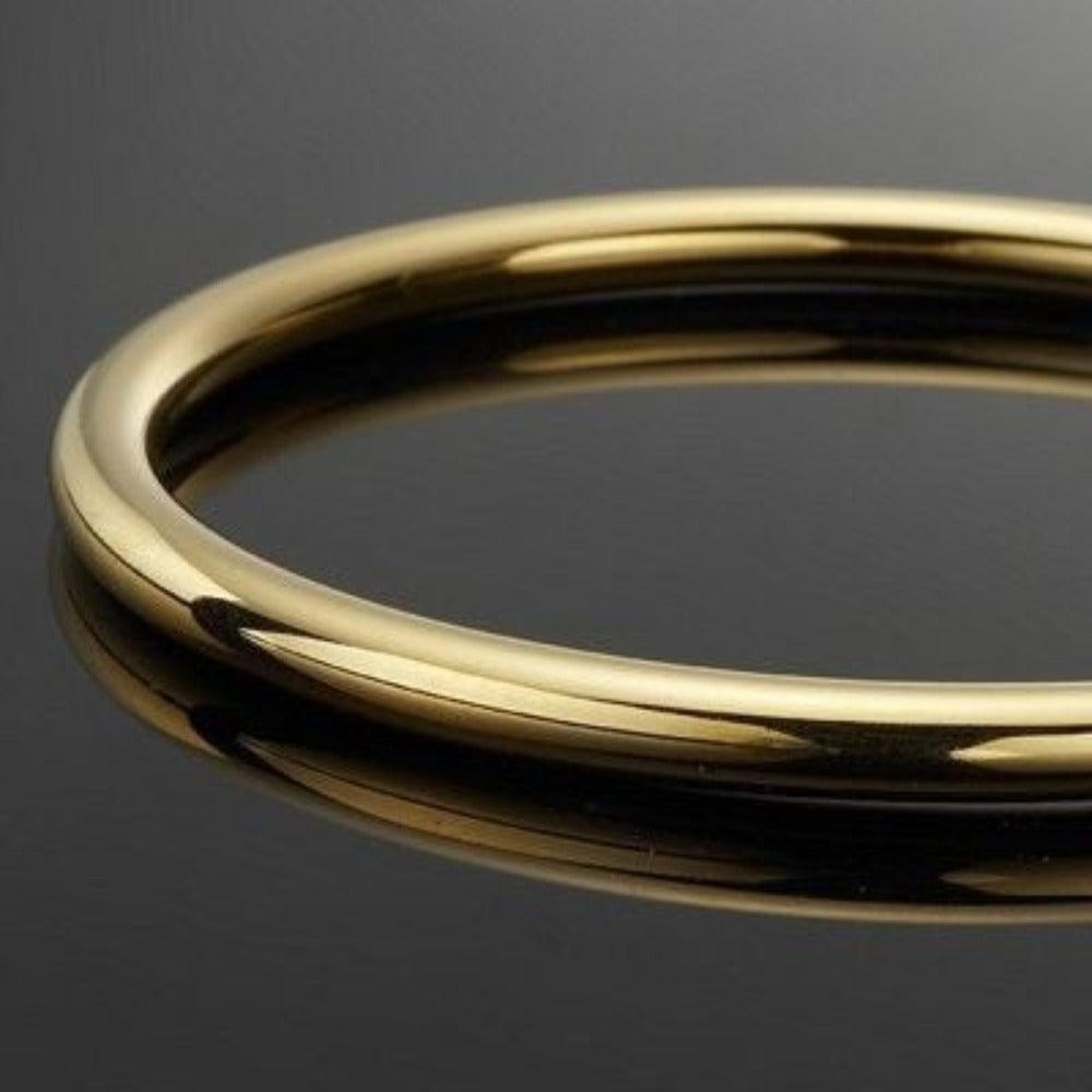 A luxurious 18ct heavy yellow gold plated classic golf bangle, showcasing its solid design and elegant finish, available in multiple sizes.
