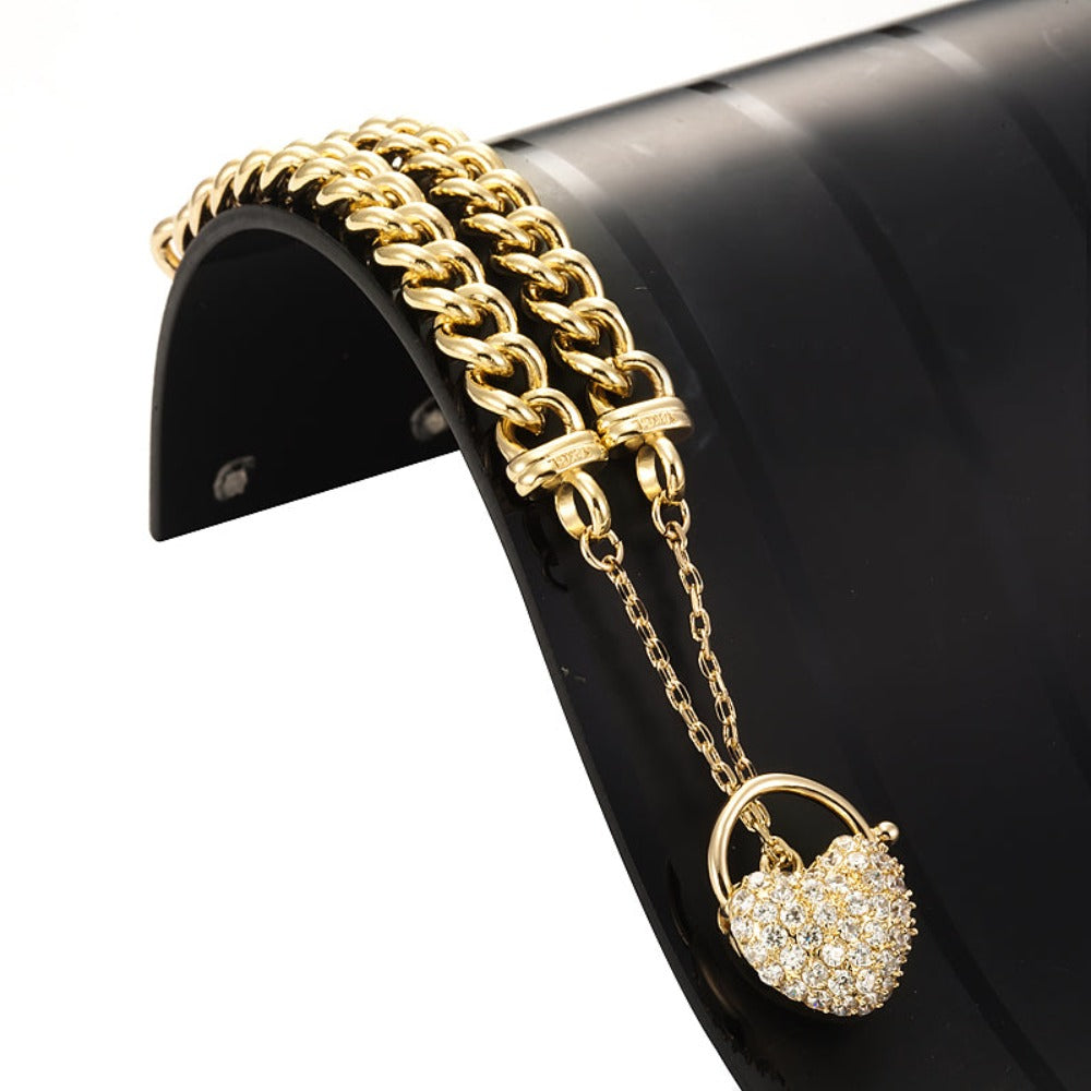 18ct Heavy Yellow Gold Plated Euro Chain Bracelet with a simulated diamond locket, showcasing its elegant design and quality craftsmanship.