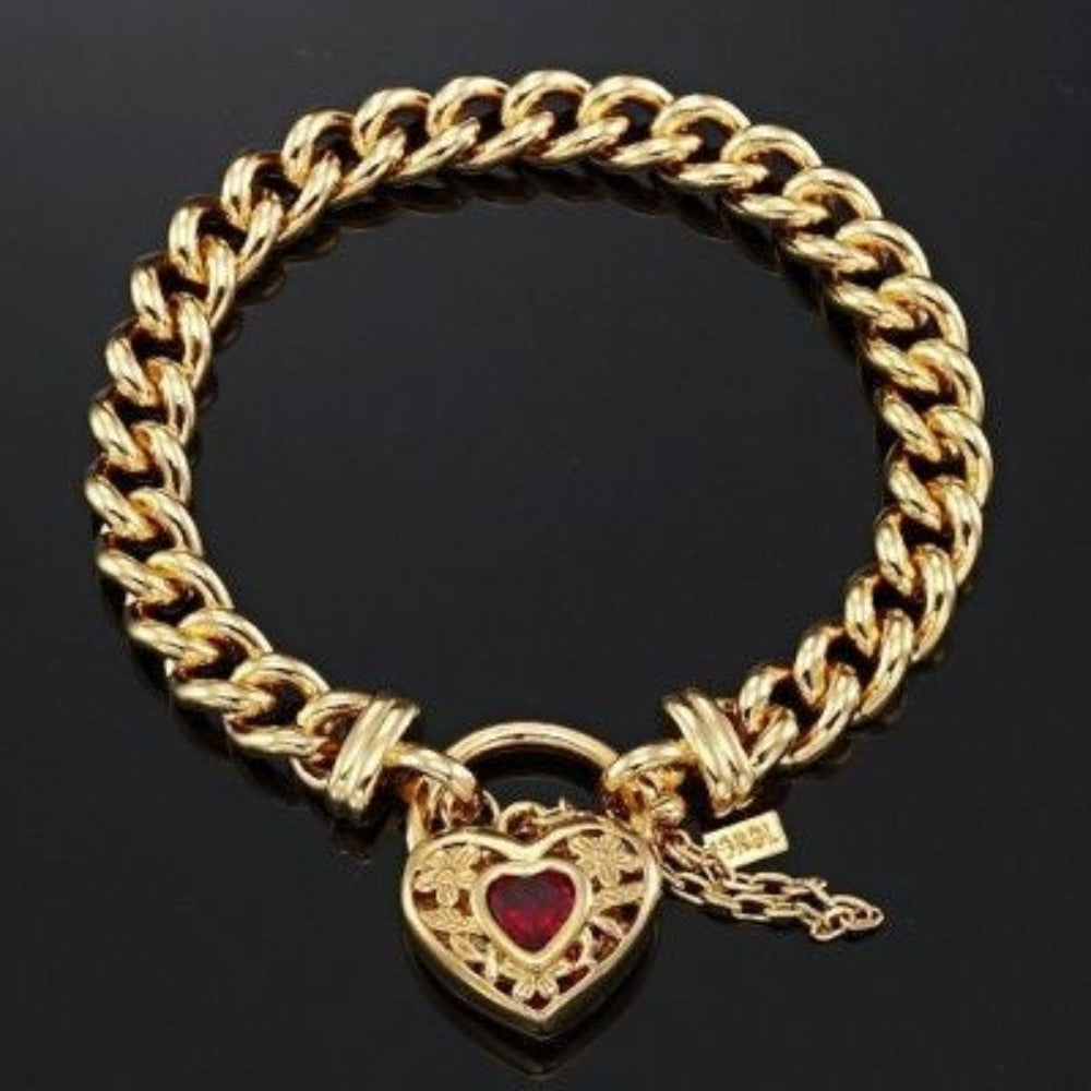 18ct Heavy Yellow Gold Plated Euro Chain Bracelet featuring a filigree locket and simulated ruby, showcasing intricate design and luxurious finish.